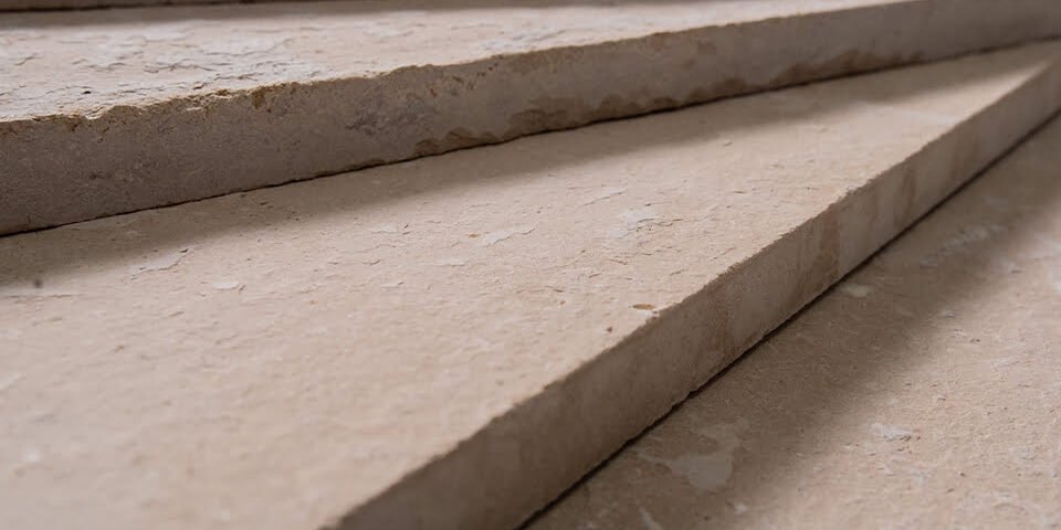 Limestone fireplace surround - carved Egyptian limestone by ELT