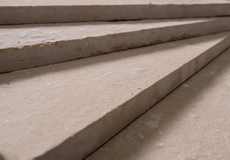 Limestone fireplace surround - carved Egyptian limestone by ELT
